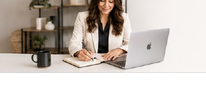 Anastasia writing at a desk